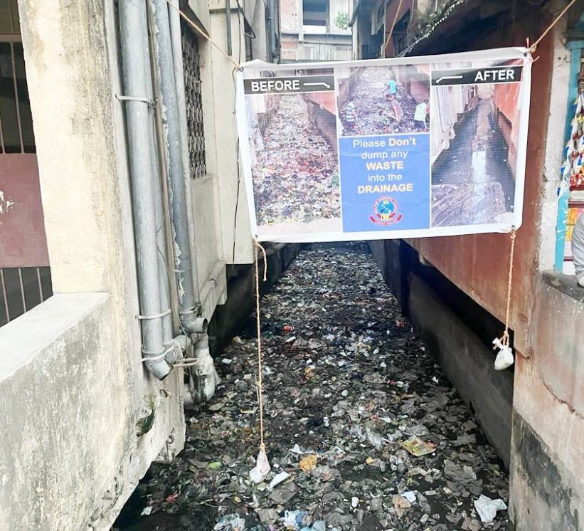 Banner erected by the DMC notifying citizens not to throw waste at the drainage located at Midland colony, Dimapur. (Morung Photo)